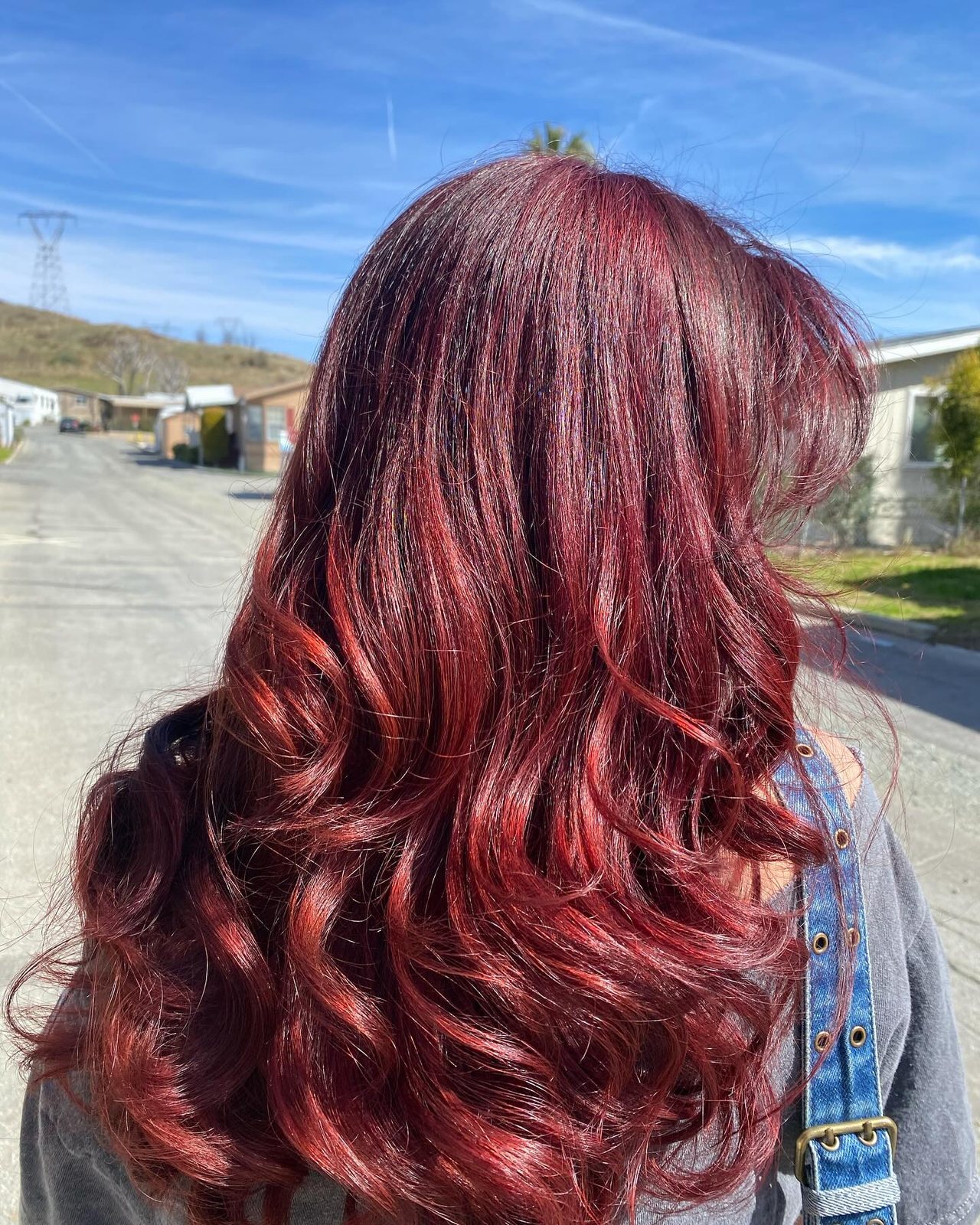 Blowout with big bouncy curls on red hair
